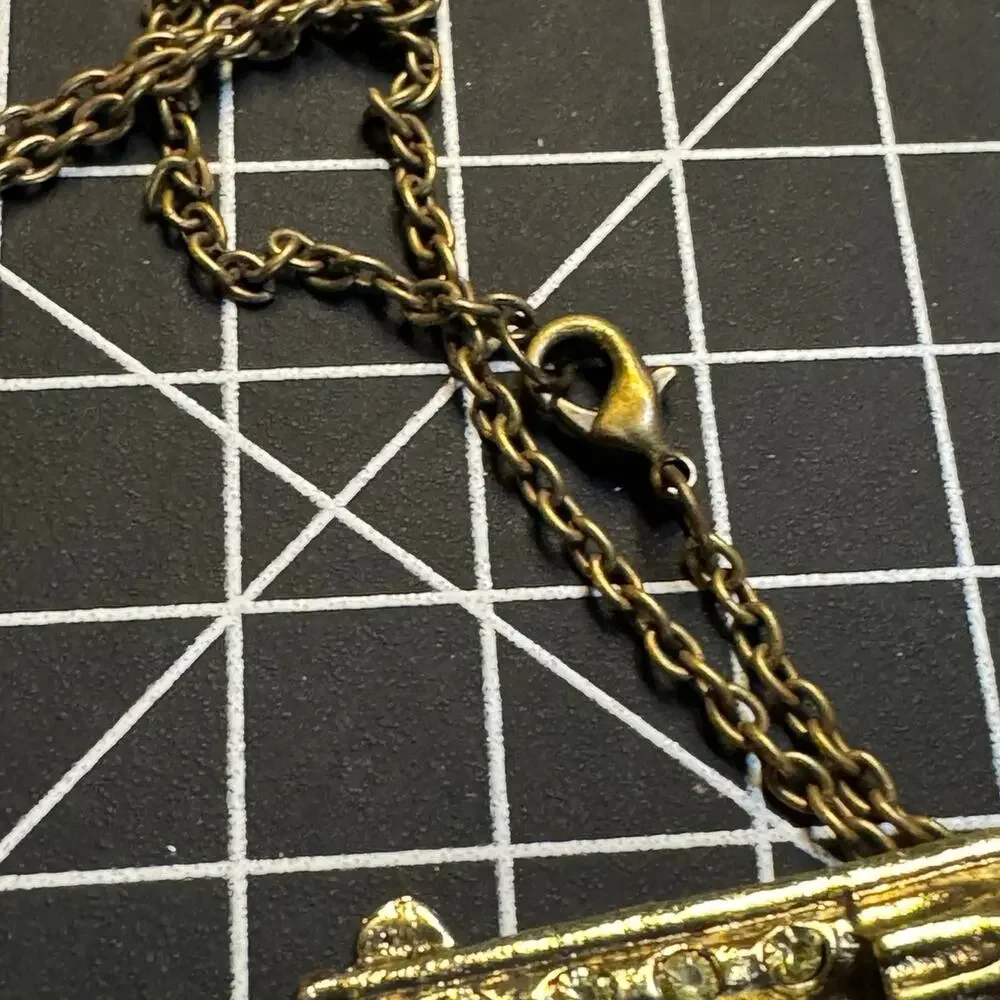 Antique gold tone rhinestone embellished pistol pendant necklace wester cowgirl